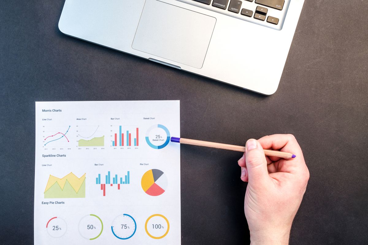 Business owner reviewing cash flow forecast charts